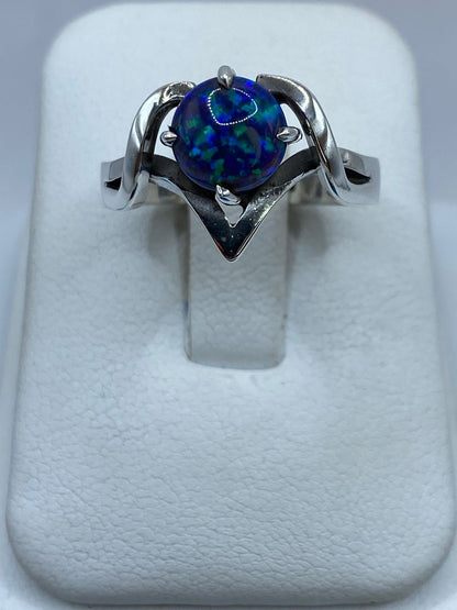 Anillo Contemporáneo de Plata .925 con Ópalo de Fuego, vista lateral