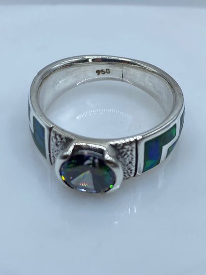 Anillo Contemporáneo de Plata .950 con Ópalo de Fuego y Zirconia Tornasol, sello de autenticidad Plata Ley .925