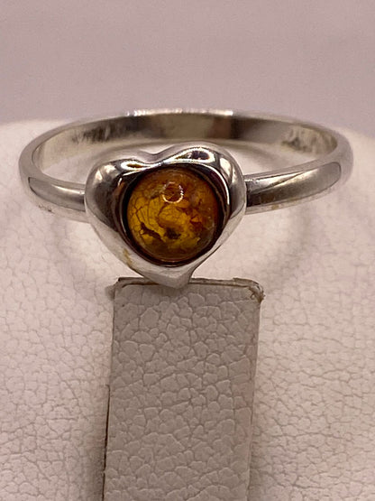 Anillo Corazón con Ámbar en Plata Ley 925, sello de autenticidad Plata Ley .925