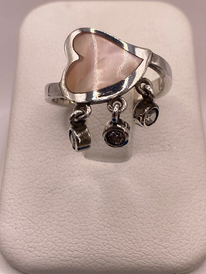 Anillo Corazón Artesanal de Plata Ley 925 con Nácar Natural — ángulo diagonal