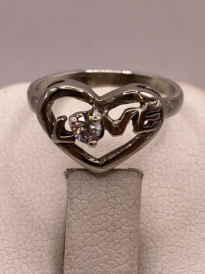 Anillo de Corazón Love en Plata Ley 925 con Zirconia Blanca, sello de autenticidad Plata Ley .925
