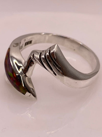 Anillo Delfín Marino de Plata Ley 950 con Ópalo de Fuego Multicolor, sello de autenticidad Plata Ley .925