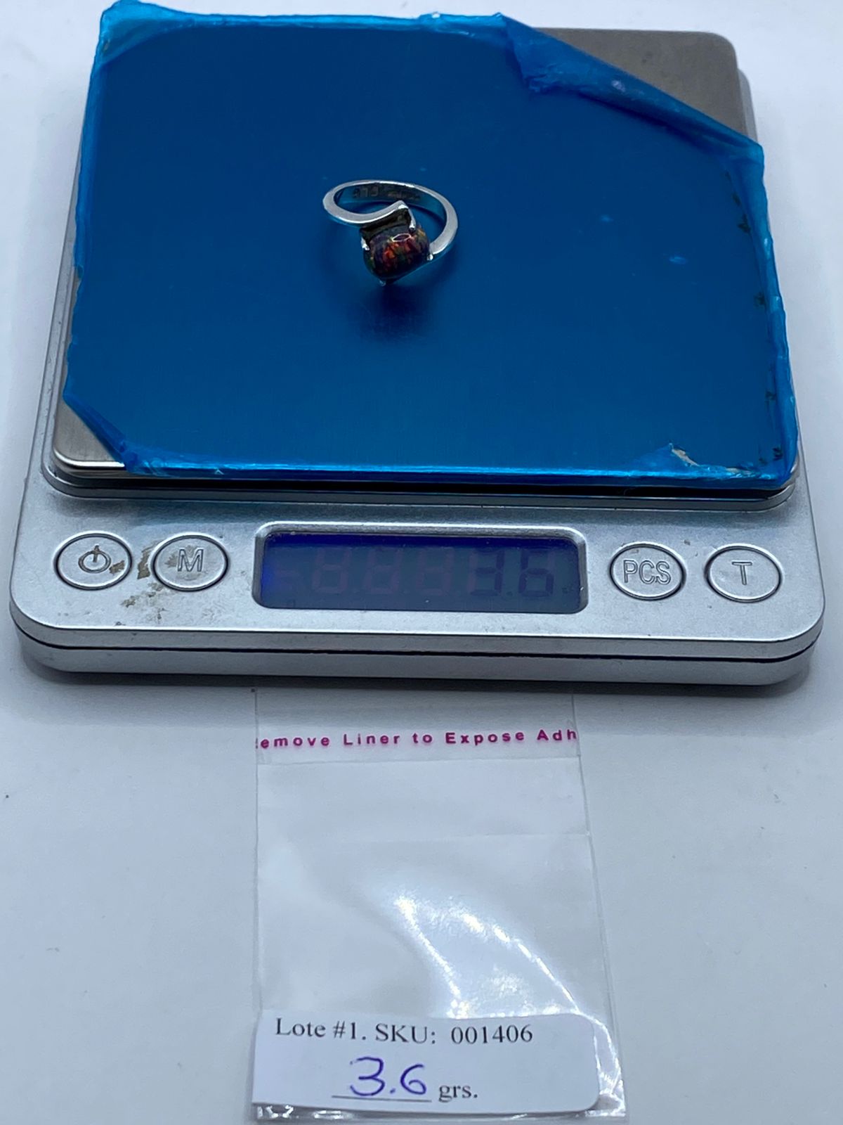 Anillo Elegante de Plata Ley 925 con Ópalo de Fuego, peso en gramos (báscula)