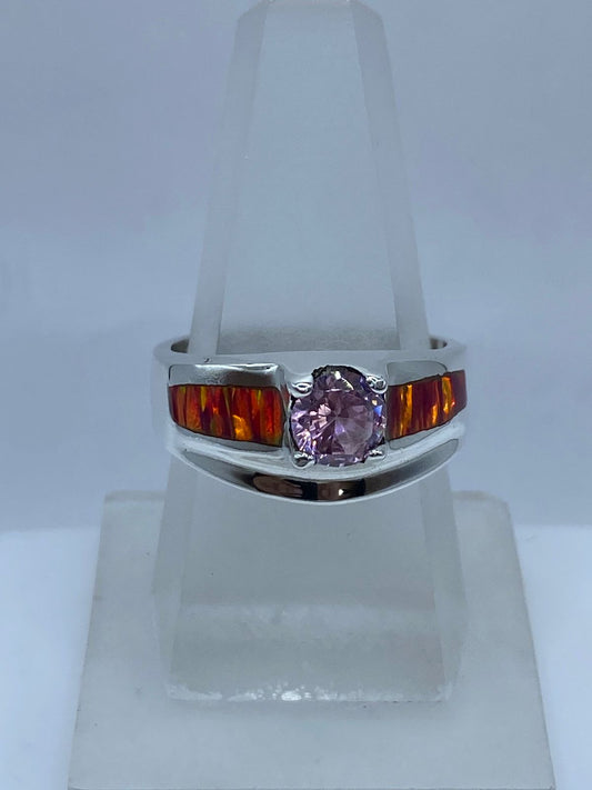 Anillo Elegante de Plata .950 con Ópalo de Fuego y Zirconia Rosa en báscula mostrando peso
