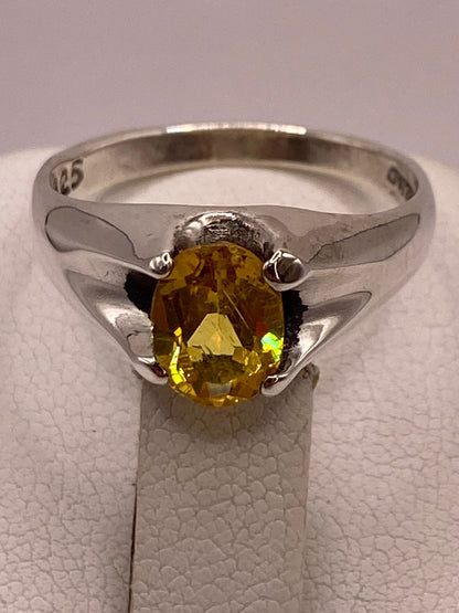 Anillo Elegante con Zirconia Amarilla en Plata Ley 925, sello de autenticidad Plata Ley .925