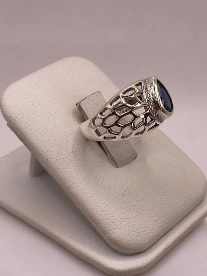 Anillo Elegante con Zirconia Azul en Plata Ley 950, vista lateral