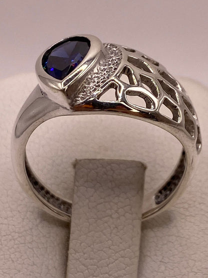 Anillo Elegante con Zirconia Azul en Plata Ley 950, vista posterior