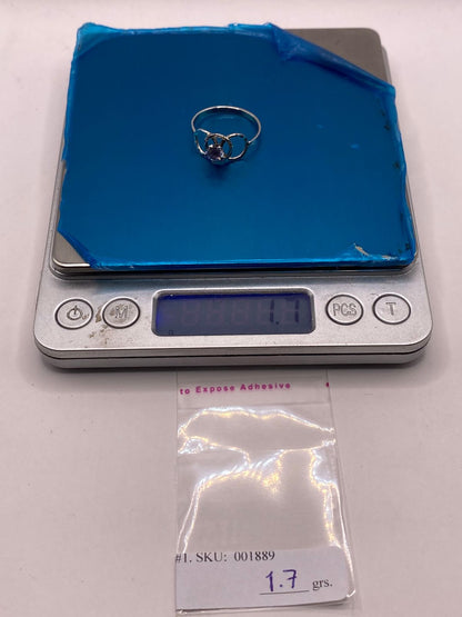 Anillo Elegante con Zirconia Lila en Plata Ley 925, peso en gramos (báscula)