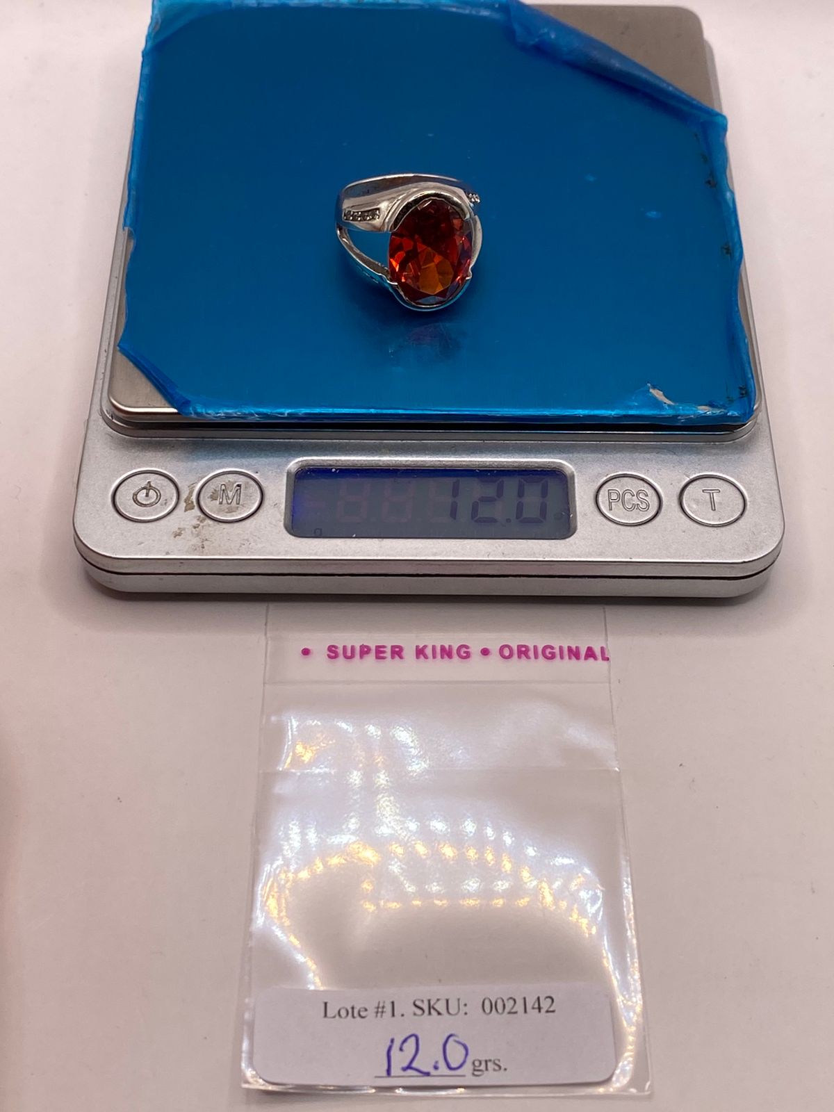 Anillo Elegante con Zirconia Naranja Intensa en Plata Ley 925, peso en gramos (báscula)