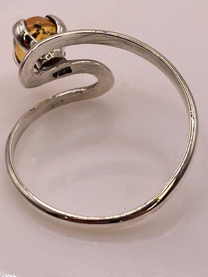 Anillo Envolvente de Plata Ley 925 con Ámbar Ahumado, sello de autenticidad Plata Ley .925