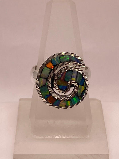 Anillo Espiral con Ópalo de Fuego Multicolor en Plata Ley .950, vista lateral