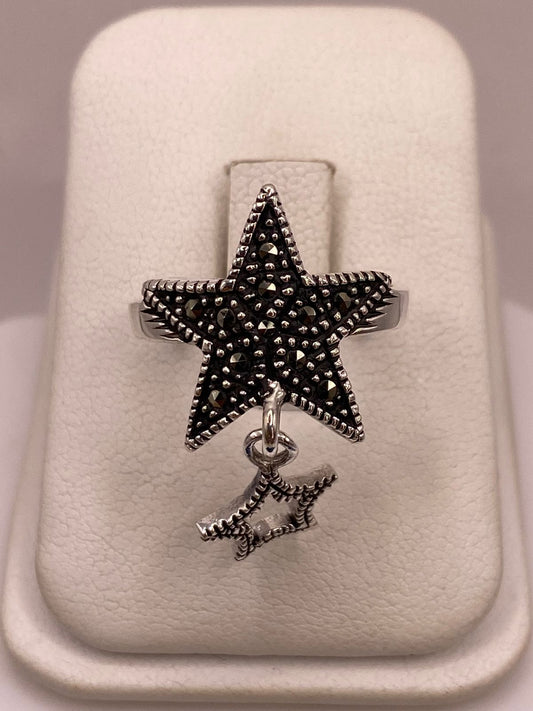 ANILLO ESTRELLA CON MARQUESITAS EN PLATA LEY 925