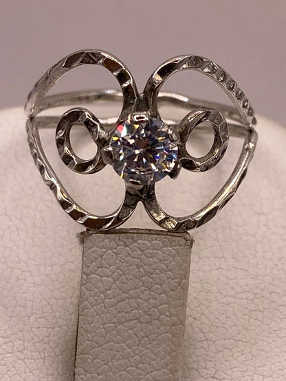 Anillo Floral Abstracto con Zirconia en Plata 925, sello de autenticidad Plata Ley .925