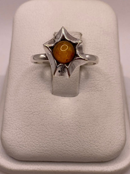 Anillo Floral con Ámbar Natural en Plata Ley 925, vista frontal