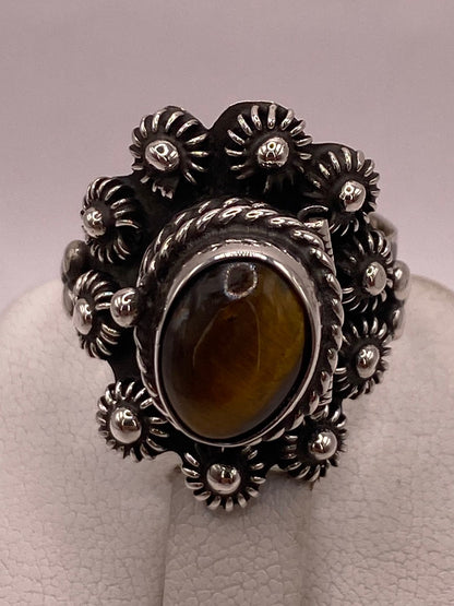 Anillo Floral de Plata Ley 925 con Ojo de Tigre, sello de autenticidad Plata Ley .925