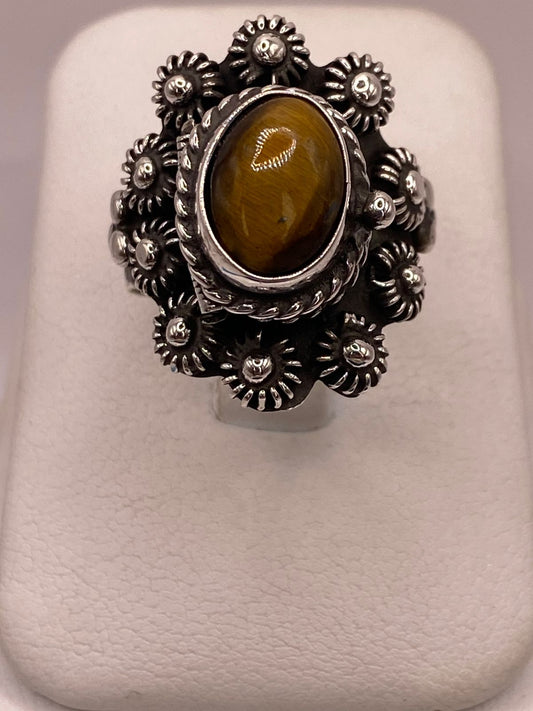 Anillo Floral de Plata Ley 925 con Ojo de Tigre en báscula mostrando peso