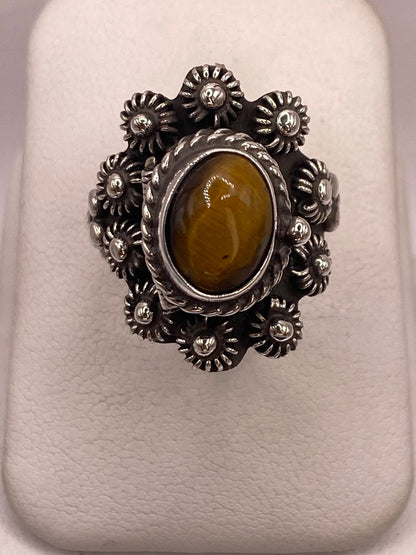 Anillo Floral de Plata Ley 925 con Ojo de Tigre, vista superior