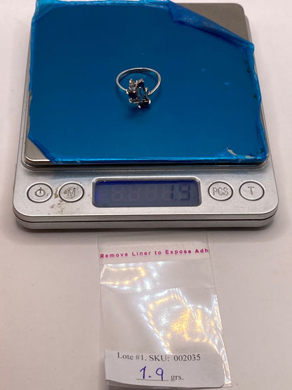Anillo Floral con Zirconias Azules en Plata Ley 925, peso en gramos (báscula)