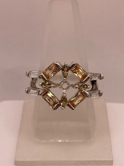 Anillo Geométrico Elegante con Zirconias Color Champagne en Plata Ley 925, vista superior