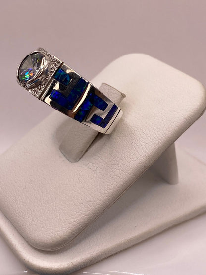 Anillo Geométrico de Plata Ley 925 con Ópalo de Fuego y Zirconia Tornasol, vista lateral