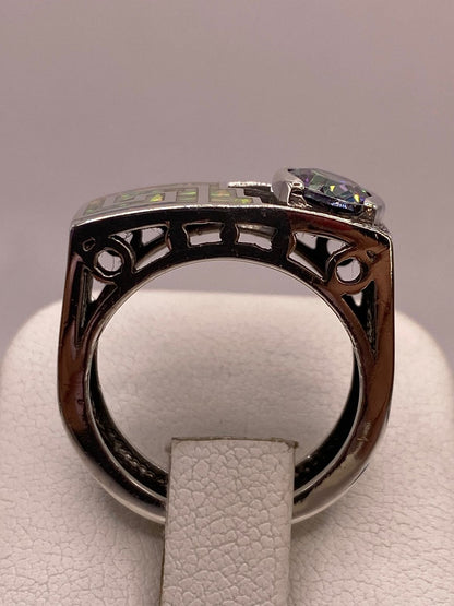 Anillo Geométrico de Plata Ley 925 con Ópalo de Fuego y Zirconia Tornasol, sello de autenticidad Plata Ley .925