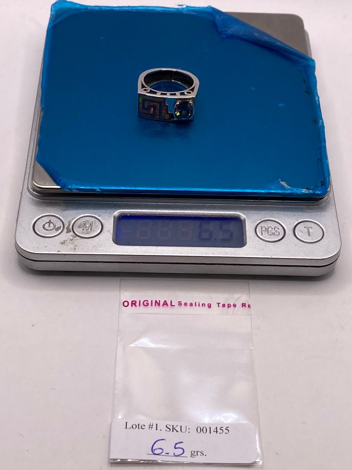 Anillo Geométrico de Plata Ley 925 con Ópalo de Fuego y Zirconia Tornasol, peso en gramos (báscula)