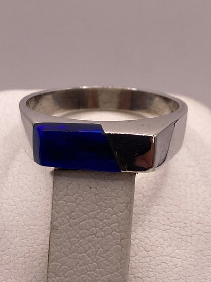 Anillo Geométrico de Plata Ley 950 con Ópalo Azul, sello de autenticidad Plata Ley .925