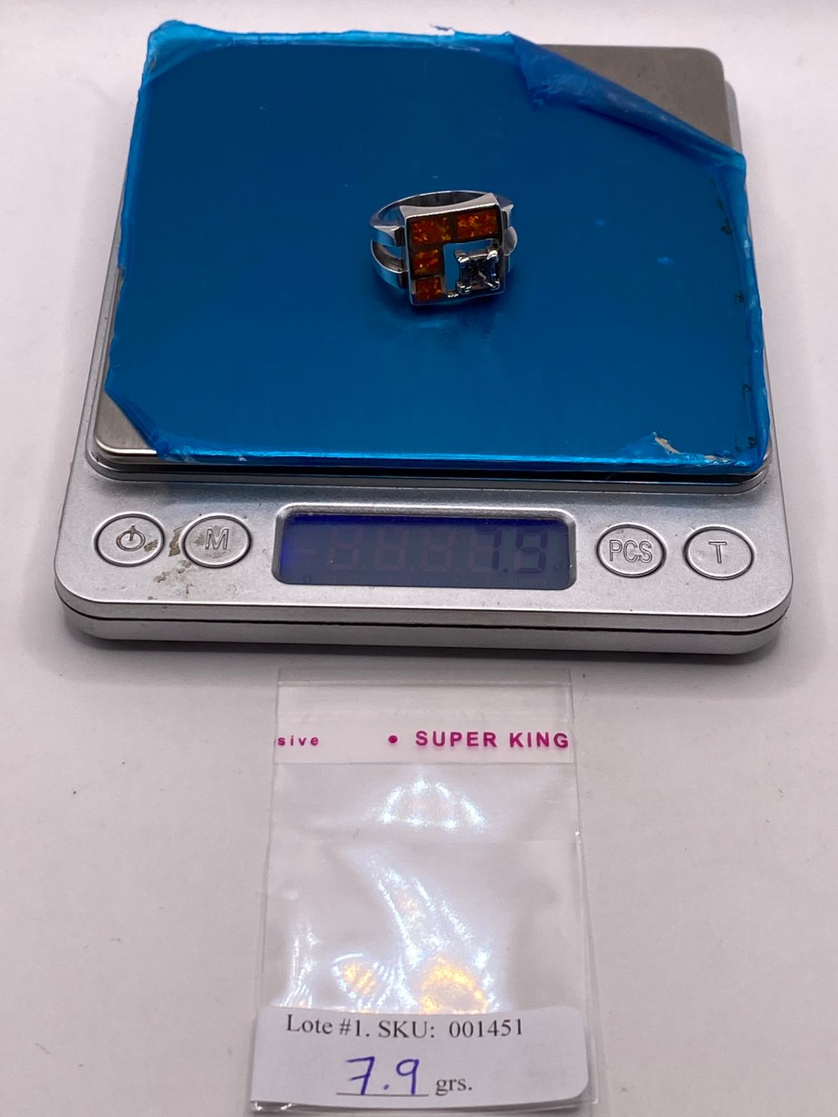 Anillo Geométrico de Plata Ley 950 con Ópalo de Fuego y Zirconia Tornasol, peso en gramos (báscula)