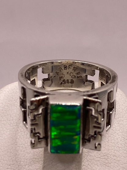 Anillo Greca Calada con Ópalo Azul y Verde en Plata Ley 950, sello de autenticidad Plata Ley .925