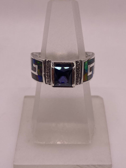 Anillo Greca Ópalo de Fuego Multicolor & Zirconia Amatista Plata 950 — ángulo diagonal