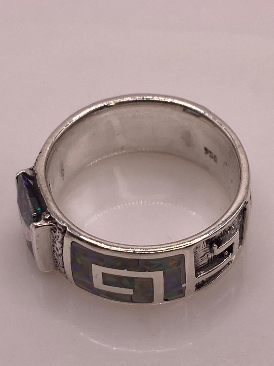 Anillo Greca con Ópalo de Fuego y Zirconia en Plata Ley .950, sello de autenticidad Plata Ley .925