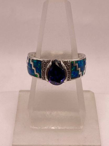 Anillo Greca con Ópalo de Fuego y Zirconia en Plata Ley .950, vista lateral