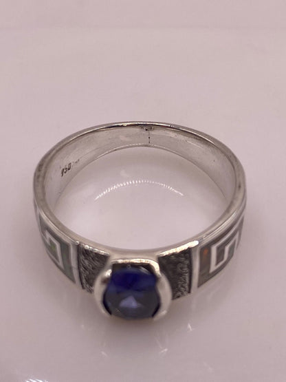 Anillo Greca Ópalo Multicolor & Zirconia Tanzanita Plata 950, sello de autenticidad Plata Ley .925