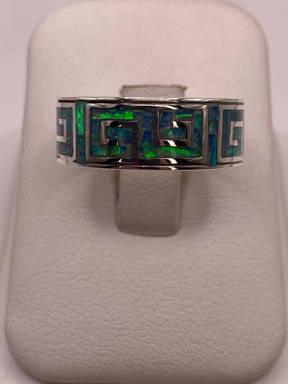 Anillo Greca de Plata Ley 950 con Ópalo Azul y Verde — ángulo diagonal