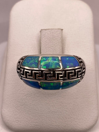 Anillo Greca de Plata Ley 950 con Ópalo de Fuego Azul Cielo, vista de detalle
