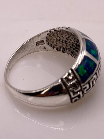 Anillo Greca de Plata Ley 950 con Ópalo de Fuego Azul Marino, sello de autenticidad Plata Ley .925