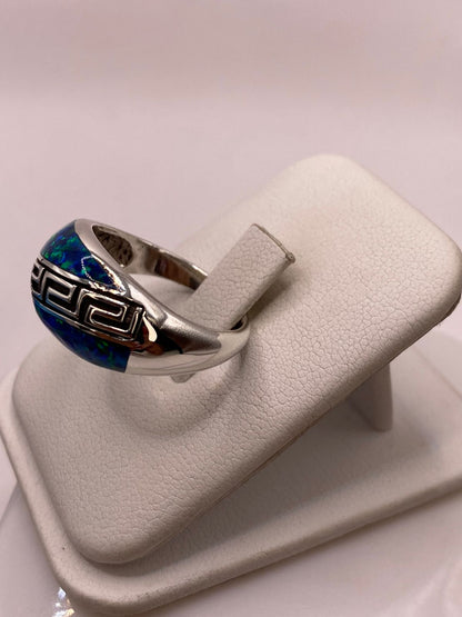 Anillo Greca de Plata Ley 950 con Ópalo de Fuego Azul Marino, vista lateral