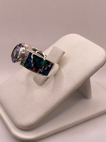 Anillo Greca de Plata Ley 950 con Ópalo de Fuego y Zirconia, vista lateral