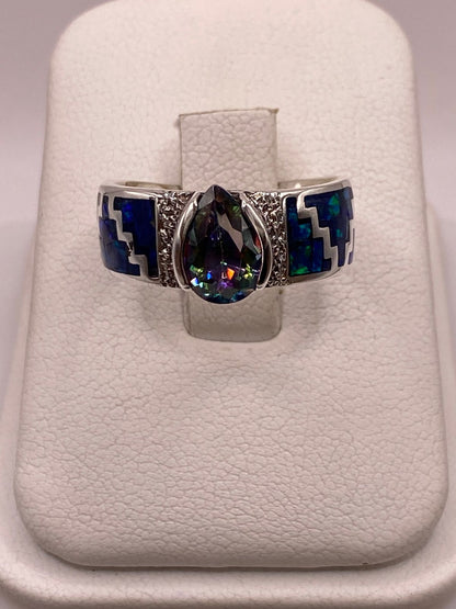 Anillo Greca de Plata Ley 950 con Ópalo de Fuego y Zirconia en báscula mostrando peso
