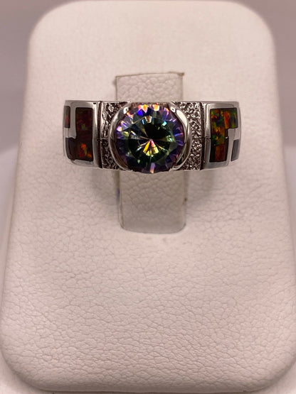 Anillo Greca de Plata Ley 950 con Ópalo de Fuego y Zirconia en báscula mostrando peso