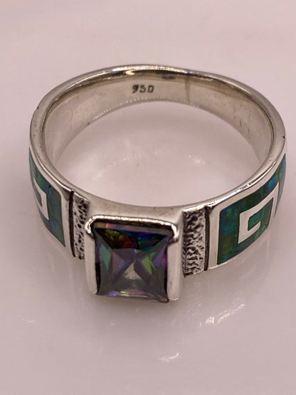 Anillo Greca de Plata Ley 950 con Ópalo de Fuego y Zirconia, sello de autenticidad Plata Ley .925