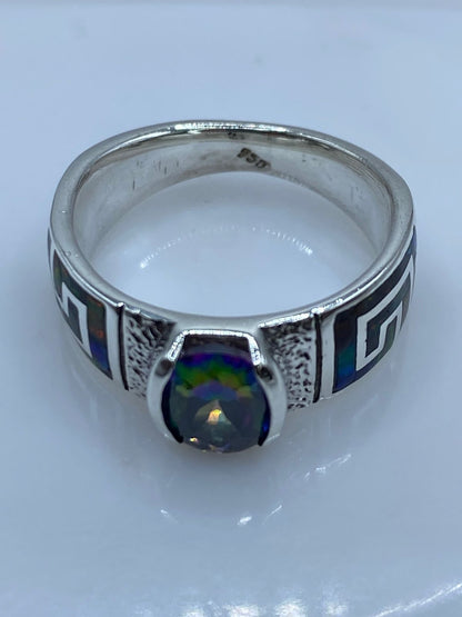 Anillo Greca de Plata .950 con Ópalo de Fuego y Zirconia, sello de autenticidad Plata Ley .925