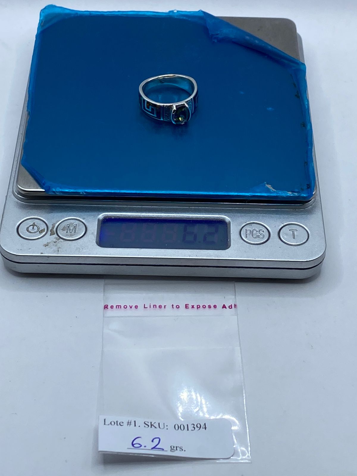 Anillo Greca de Plata .950 con Ópalo de Fuego y Zirconia, peso en gramos (báscula)