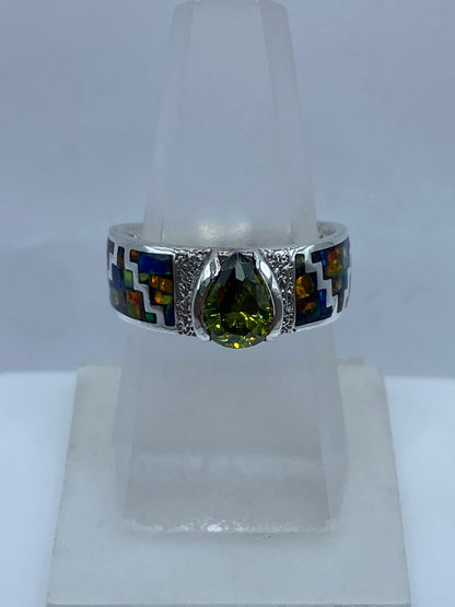Anillo Greca de Plata .950 con Ópalo de Fuego y Zirconia, vista lateral