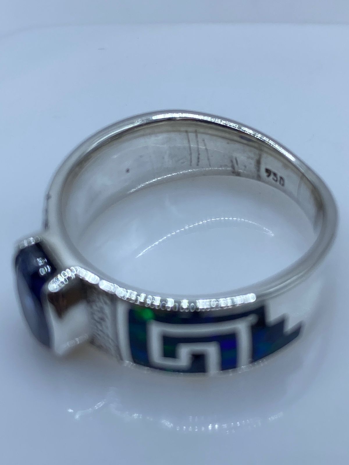 Anillo Greca de Plata .950 con Ópalo de Fuego y Zirconia Azul, sello de autenticidad Plata Ley .925