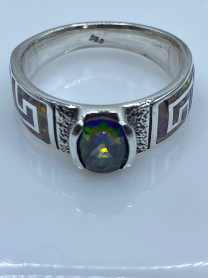 Anillo Greca de Plata .950 con Ópalo de Fuego y Zirconia Multicolor, sello de autenticidad Plata Ley .925