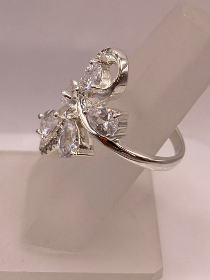 Anillo Infinito de Plata Ley 925 con Zirconias Blancas, sello de autenticidad Plata Ley .925