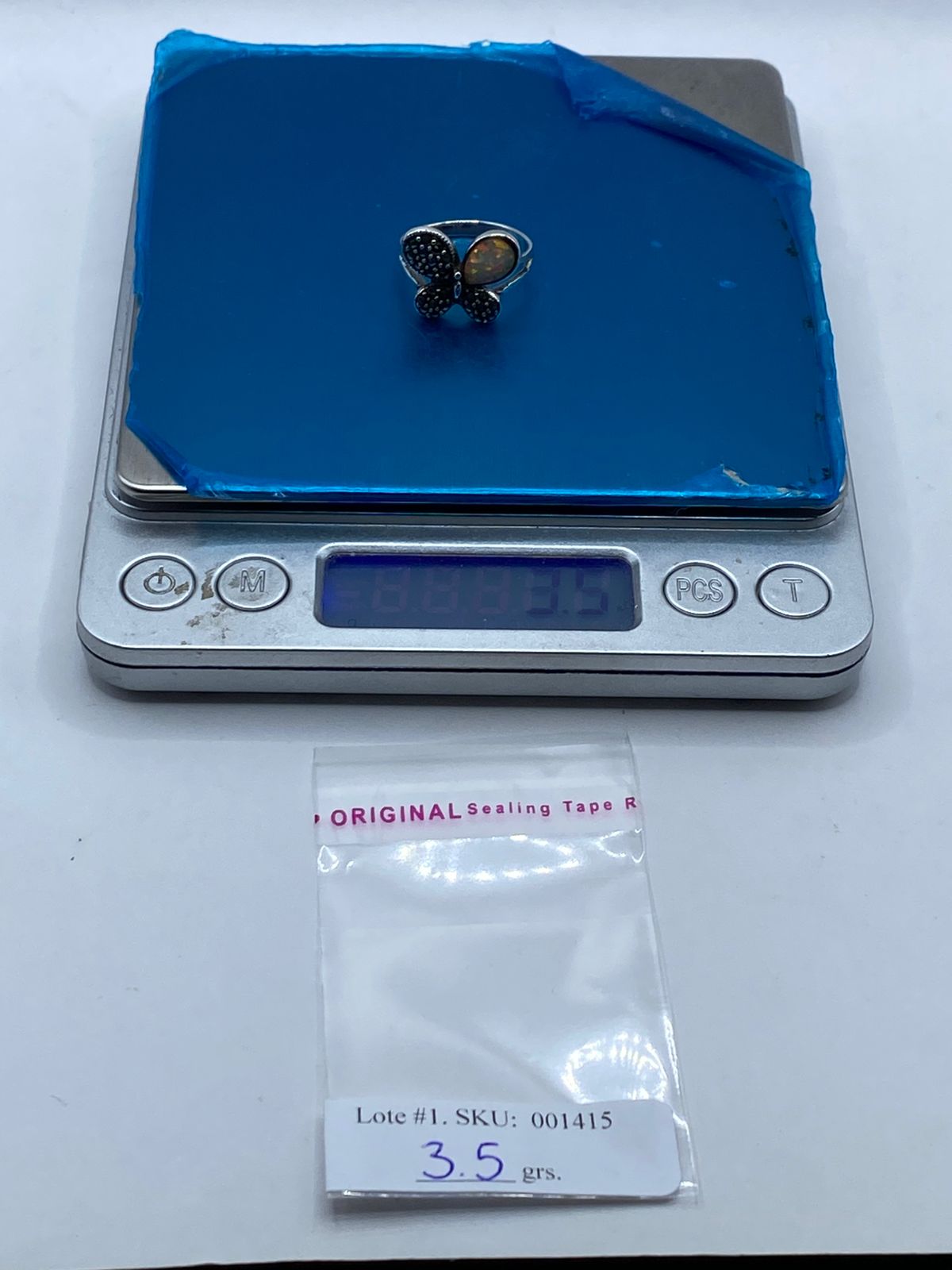 Anillo Mariposa de Plata Ley 925 con Ópalo de Fuego y Marquesita, peso en gramos (báscula)