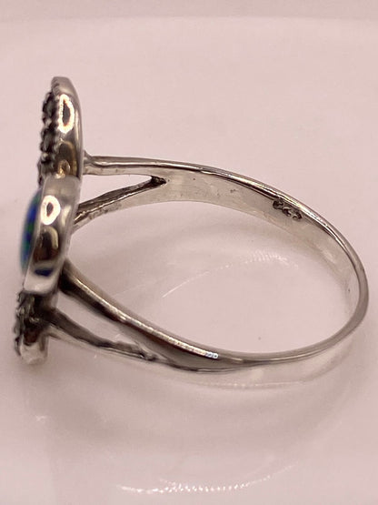 Anillo Mariposa de Plata Ley 925 con Ópalo de Fuego y Marquesitas, sello de autenticidad Plata Ley .925