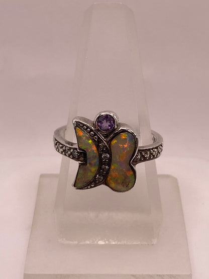 Anillo Mariposa de Plata Ley 925 con Ópalo de Fuego, Zirconias y Detalle Violeta, sello de autenticidad Plata Ley .925
